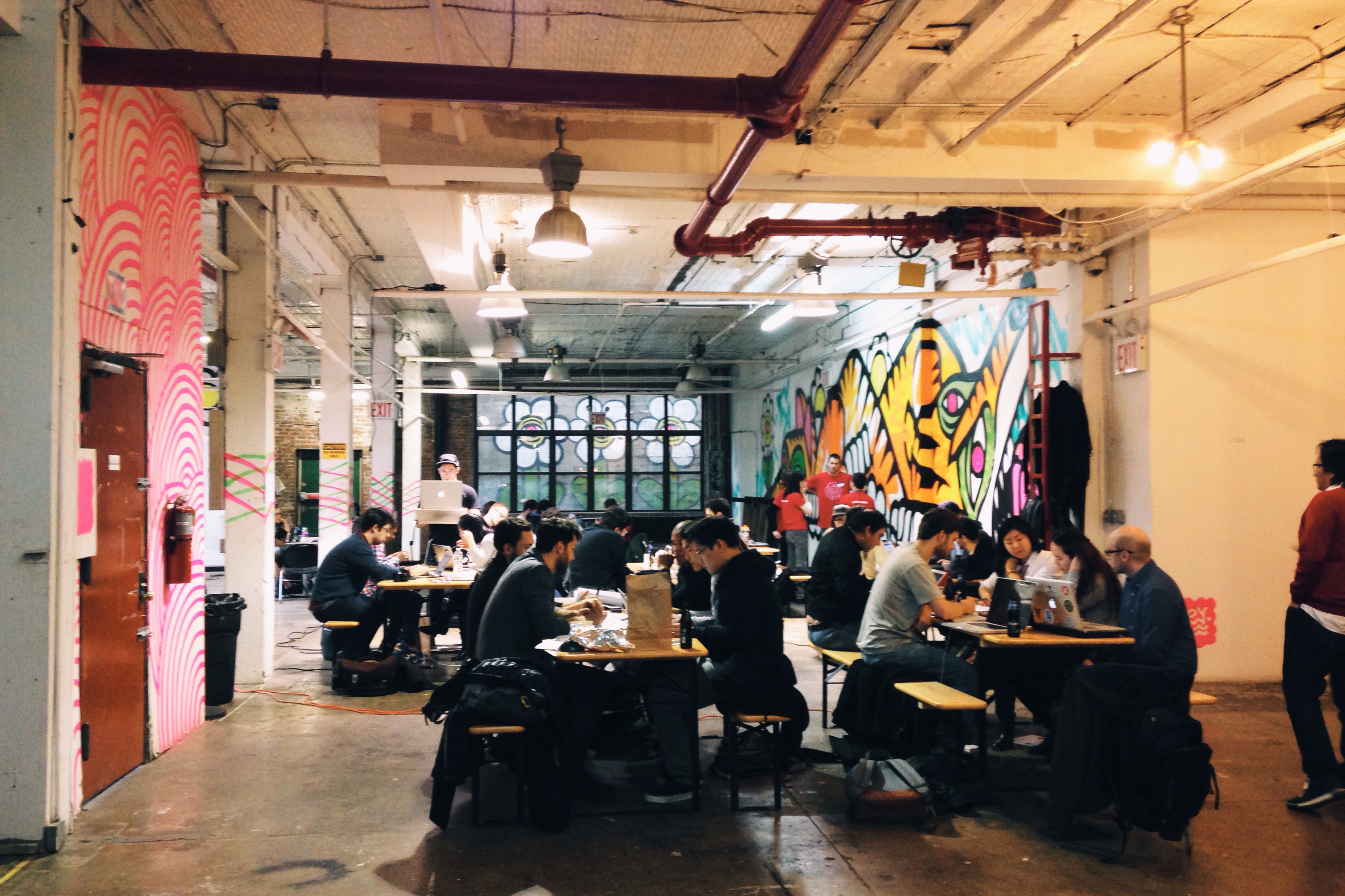 Lots of people working on laptops